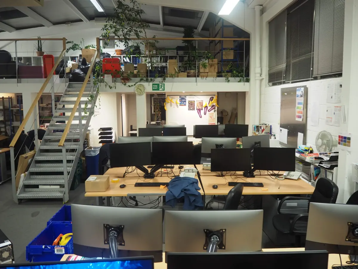 Actual workstations in a business office during an IT equipment upgrade